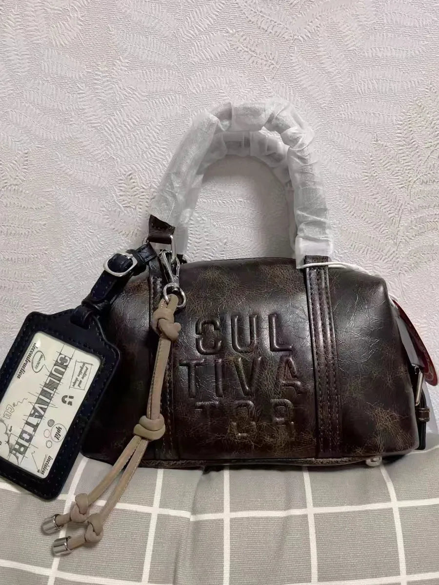 Sac Boston Jade — Vintage en Cuir