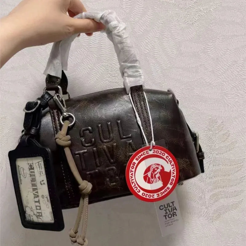 Sac Boston Jade — Vintage en Cuir