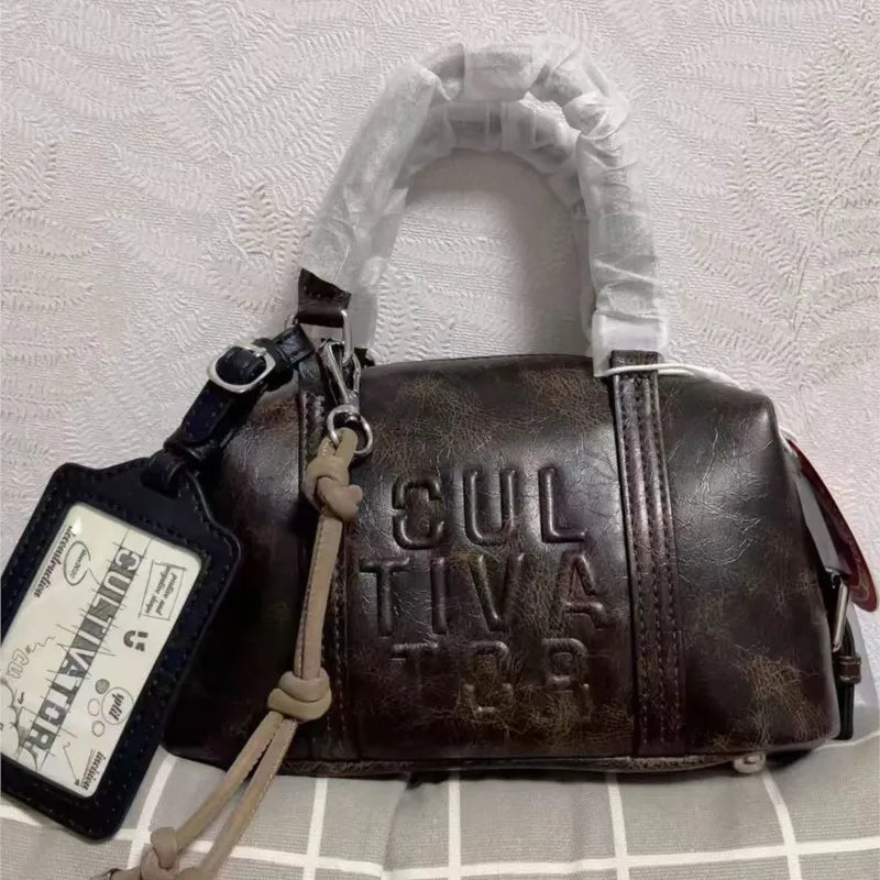 Sac Boston Jade — Vintage en Cuir